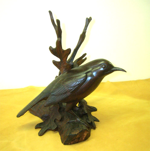 Black Billed Cuckoo - carving by John Sharpe