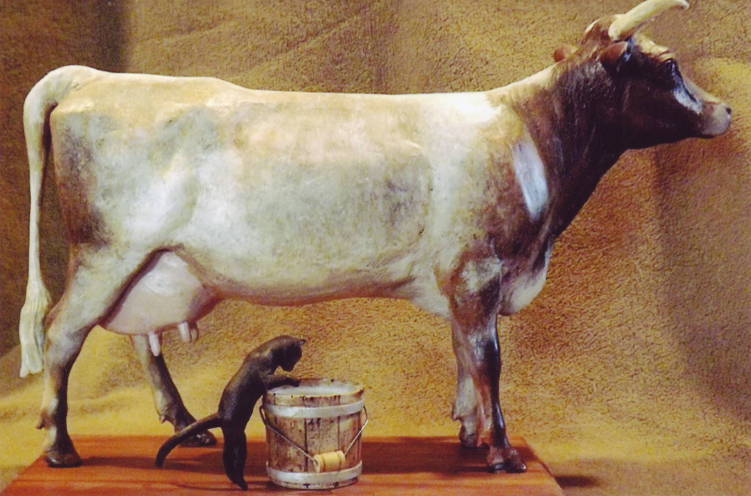 Cow with Kitten - carved by Sue Eaton
